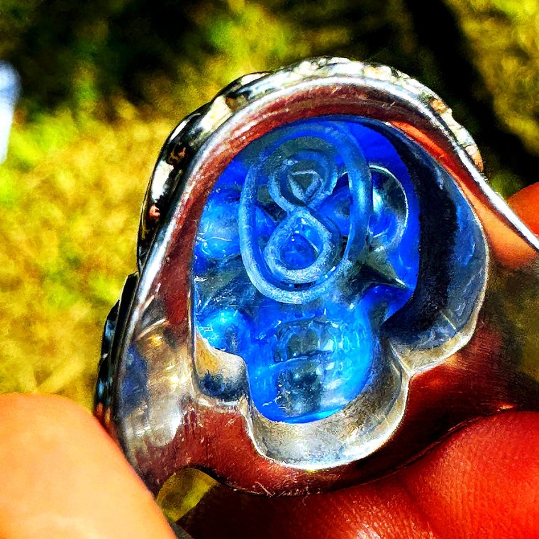 The figure-eight carved into the back of the crystal skull — the Ashta emblem