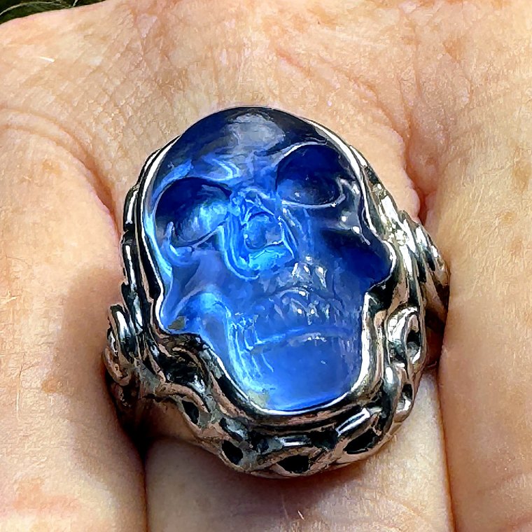 The Ashta Project skull ring worn on the hand